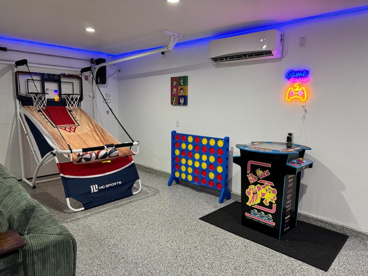 Game room with Ms. Pac-Man arcade machine, arcade basketball and giant Connect Four